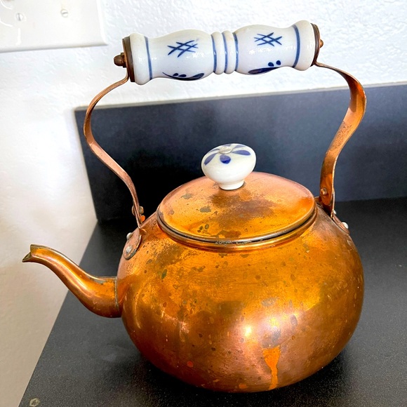 Other - Copper petal with ceramic handle.